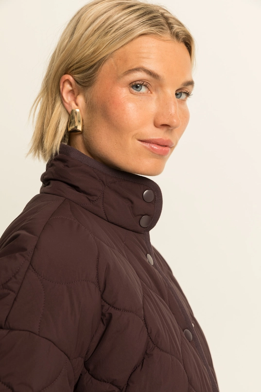 Coat woven stepped