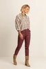 Coated skinny jeans