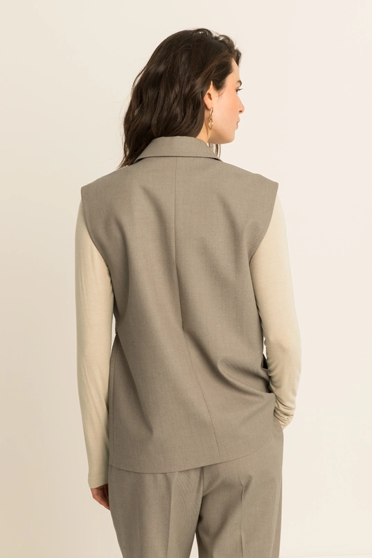 Lang gilet met ceintuur