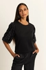 Top met paillettenmouwen