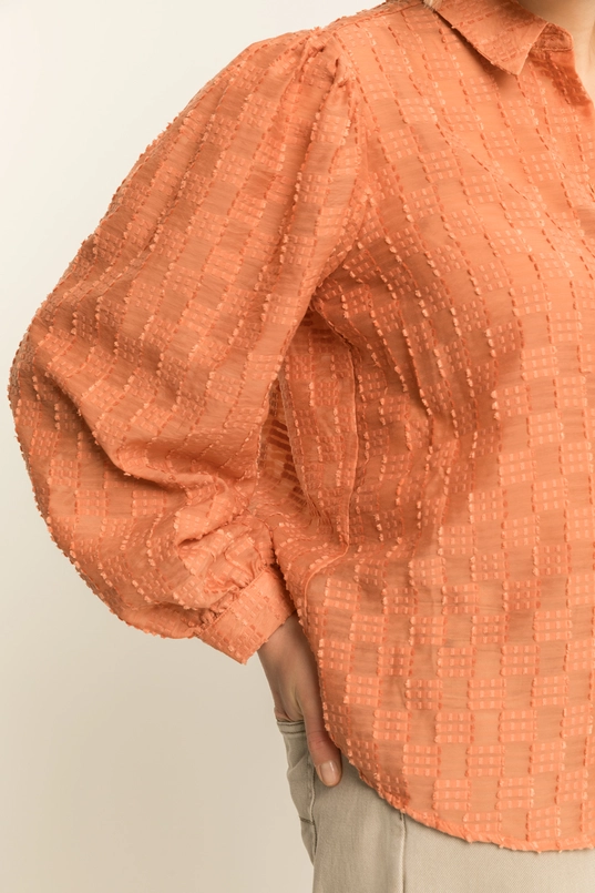 Volumineuze blouse met structuur
